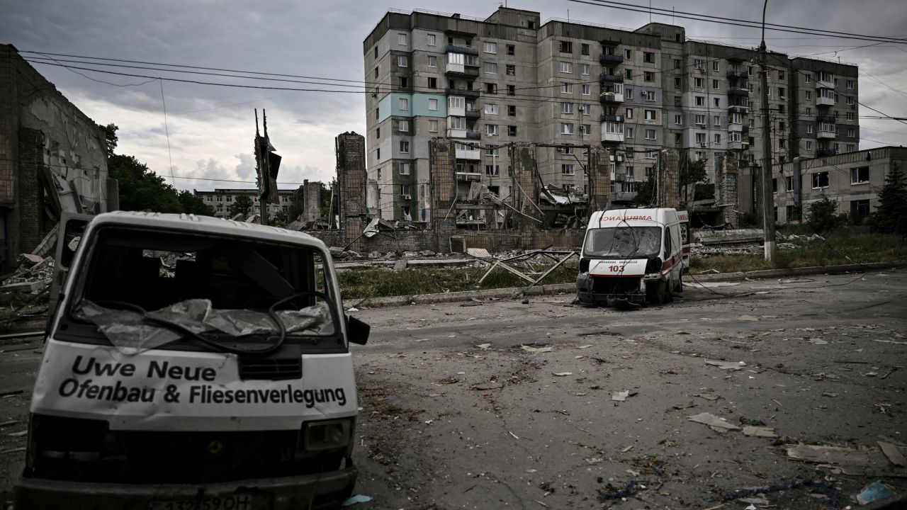 Destroyed vehicles are pictured in the city of Lysychansk in the eastern Ukrainian region of Donbas on June 18, 2022. 
