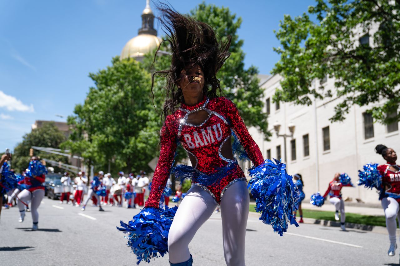 Members of the Baltimore All-Stars Marching Unit perform in the Juneteenth Atlanta Black History parade on Saturday.