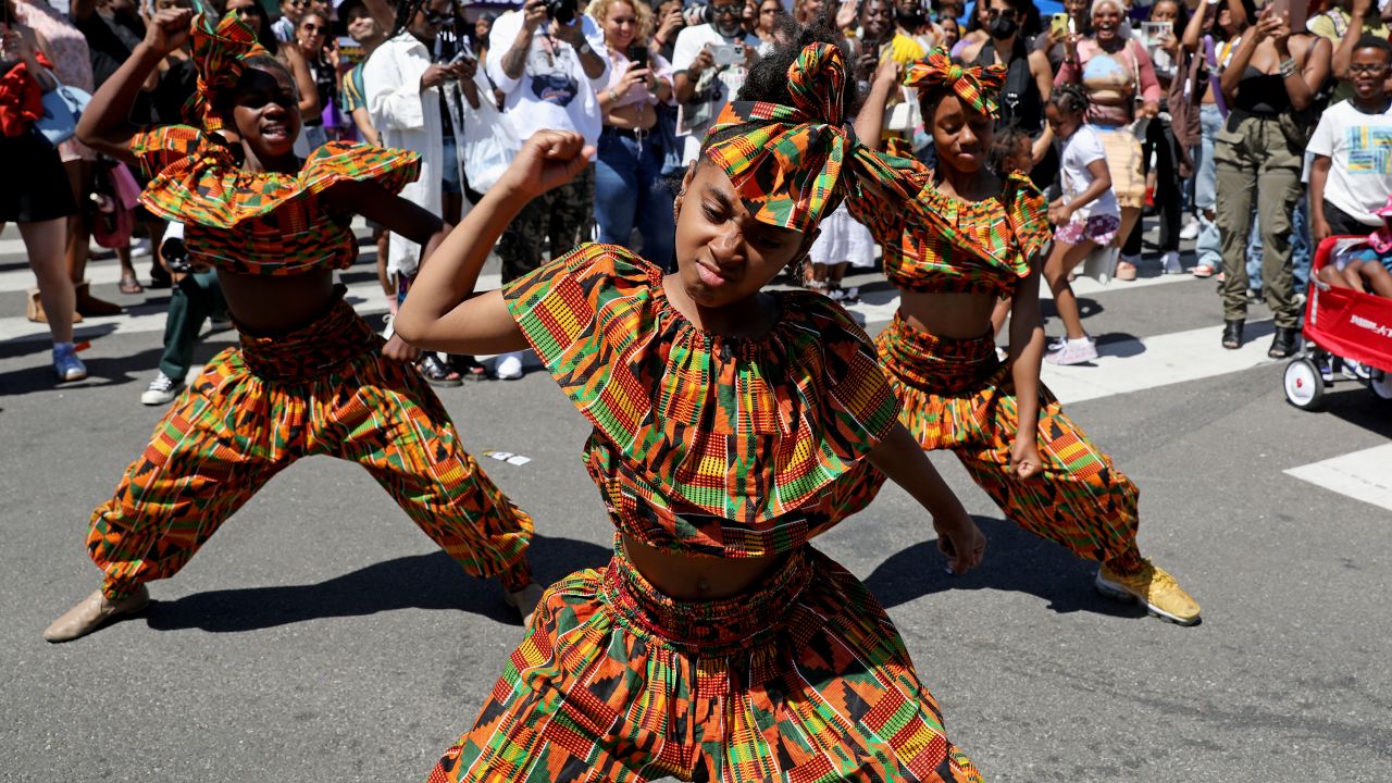 Members of the Victory Dancers Crenshaw District dance team perform at the Leimert Park Juneteenth Festival in Los Angeles on Saturday, June 18.
