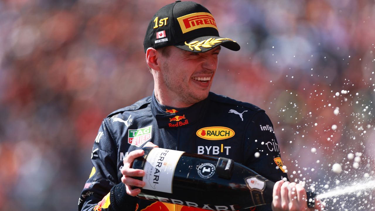 Verstappen celebrates on the podium.