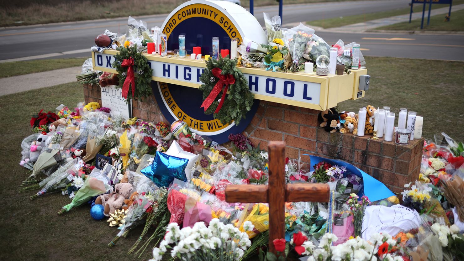 A memorial outside Oxford High School last year to the shooting victims killed on November 30, 2021. 

