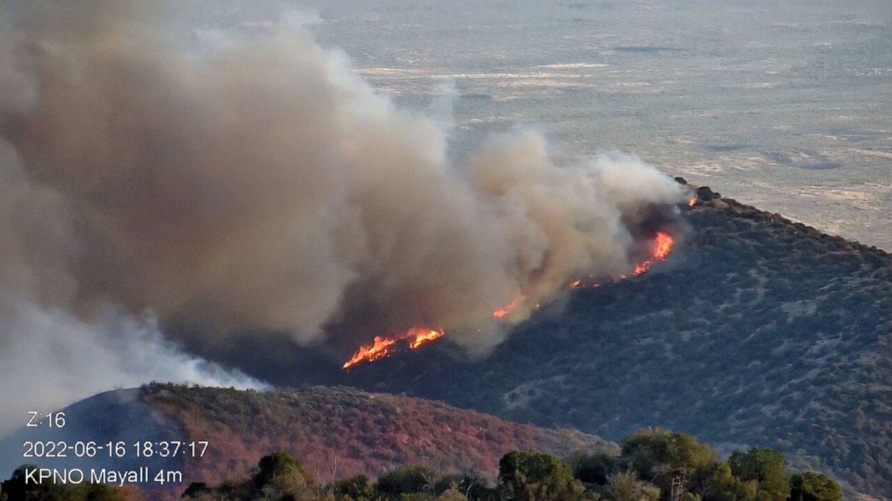 The Contreras Fire burns on Kitt Peak Thursday.