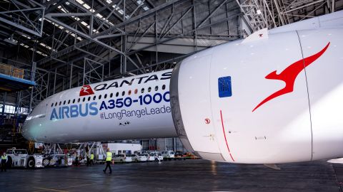 An Airbus A350-1000 aircraft is seen inside a hangar at Sydney international airport on May 2, 2022, to mark a major fleet announcement by Australian airline Qantas. - Qantas announced on May 2 it will launch the world's first non-stop commercial flights from Sydney to London and New York by the end of 2025, finally conquering the "tyranny of distance". (Photo by Wendell TEODORO / AFP) (Photo by WENDELL TEODORO/AFP via Getty Images)
