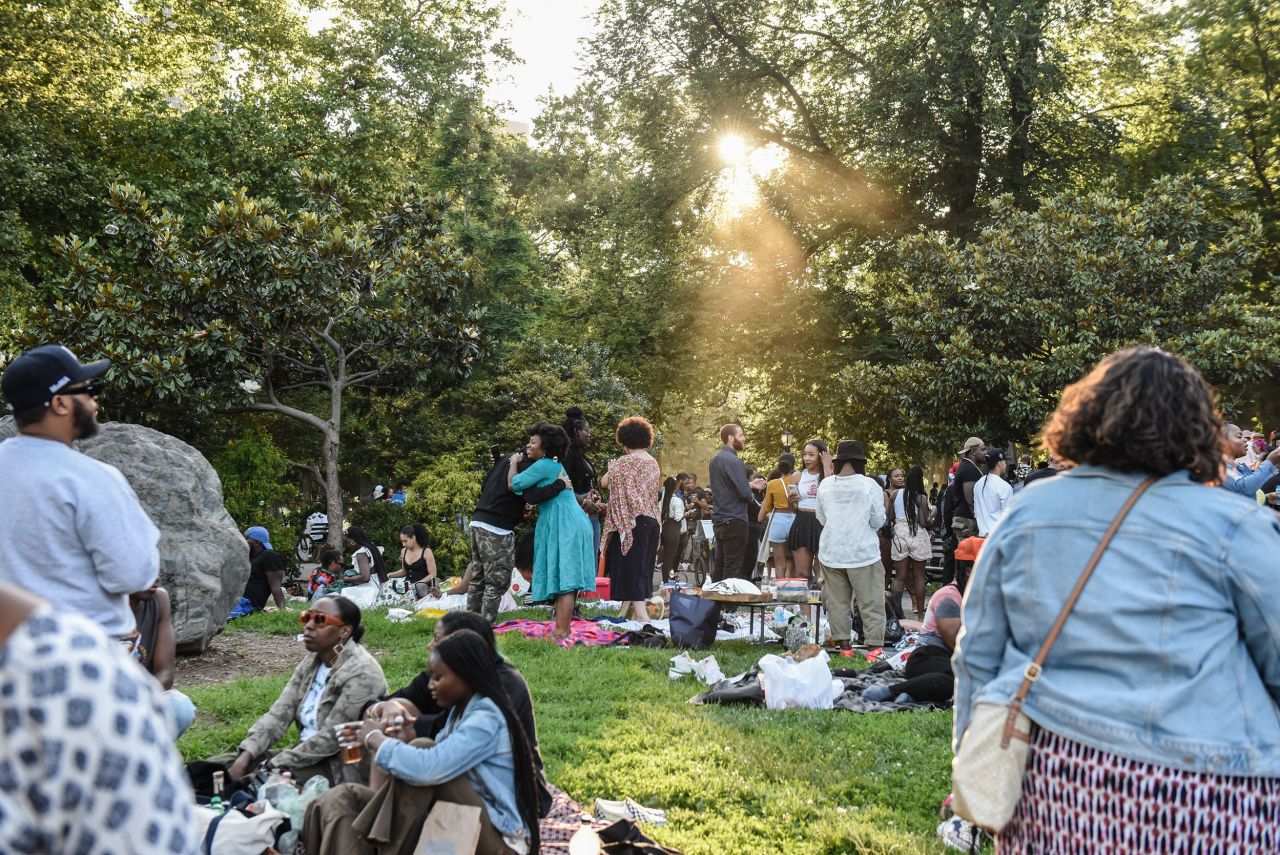 People attend a Juneteenth celebration in New York's Fort Greene Park on Sunday.