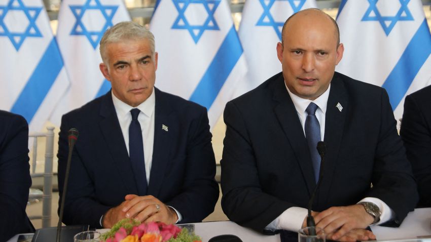 Israeli Prime Minister Naftali Bennett (R) and Foreign Minister Yair Lapid, attend a weekly cabinet meeting in Jerusalem, on May 29, 2022. (Photo by GIL COHEN-MAGEN / POOL / AFP) (Photo by GIL COHEN-MAGEN/POOL/AFP via Getty Images)