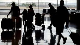 Travelers are shown at Salt Lake City International Airport Monday, June 13, 2022, in Salt Lake City.  