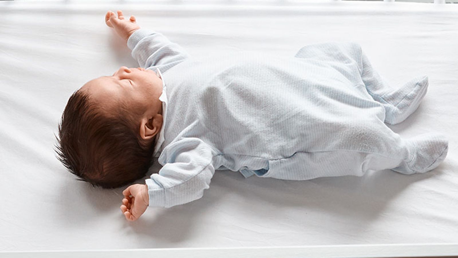 When should parents introduce pillows to their babies?
