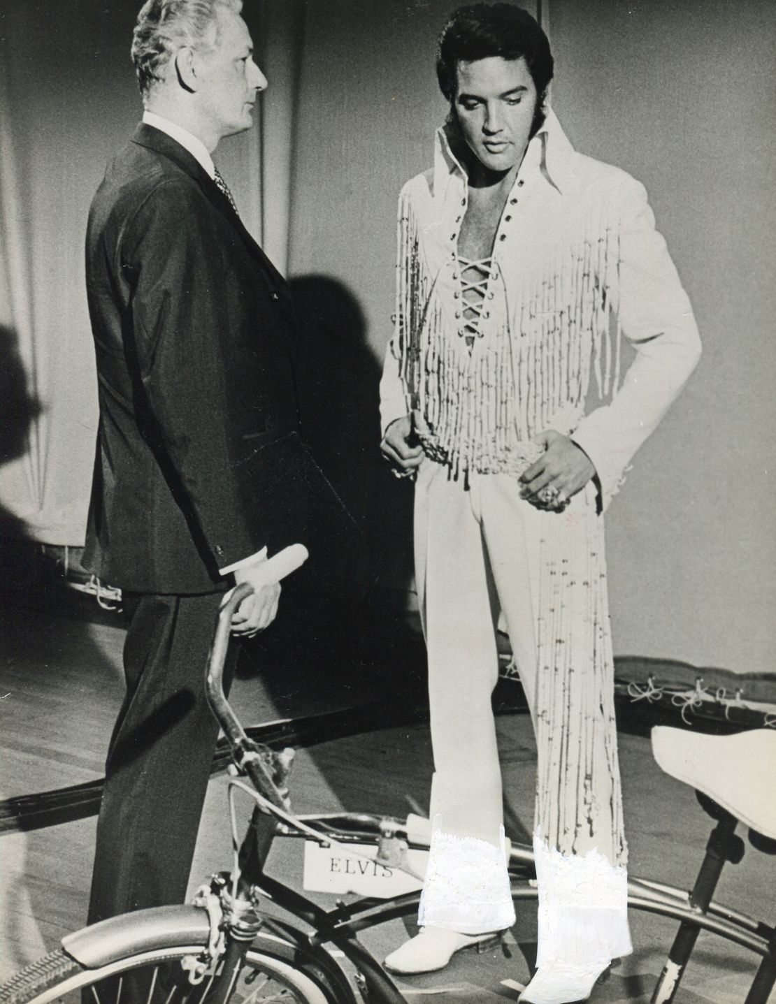 Elvis Presley in a white fringed jumpsuit in 1973.