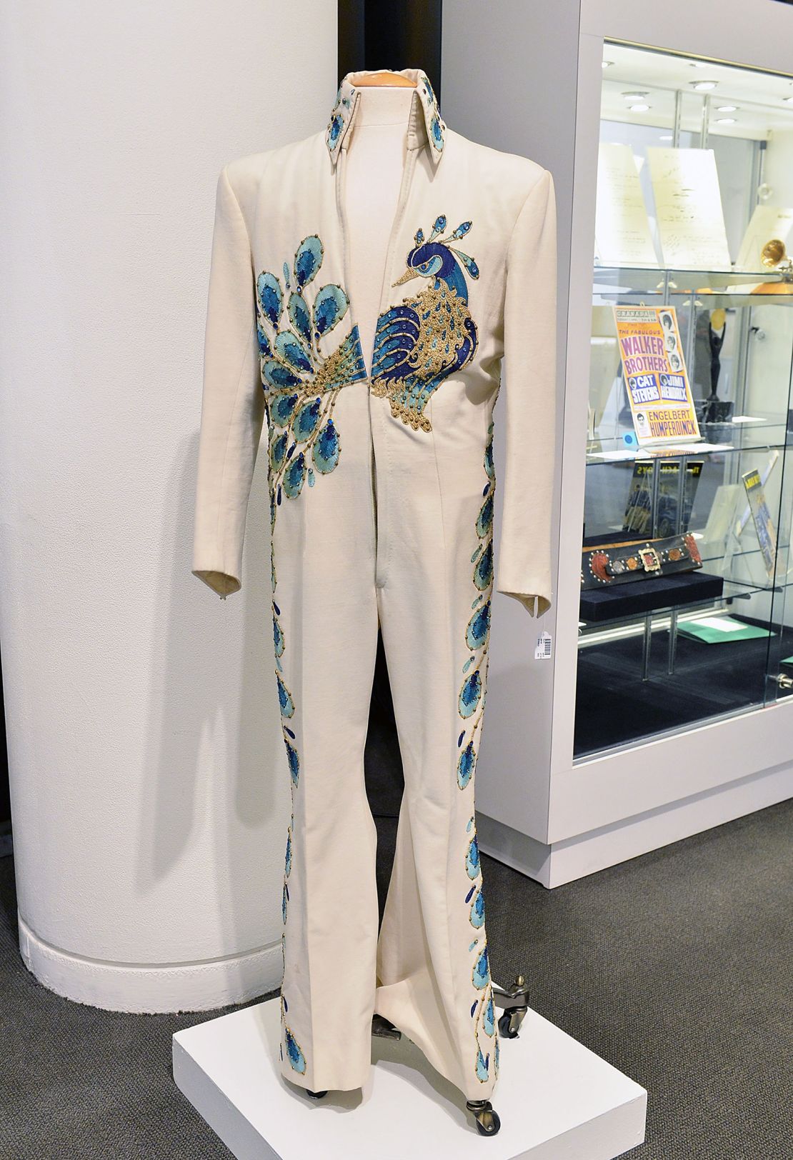 Elvis Presley's Peacock Jumpsuit worn during concert apperances in 1974, shown at the press preview "A Rock & Roll History: Presley To Punk" at Sotheby's on June 20, 2014 in New York City. 