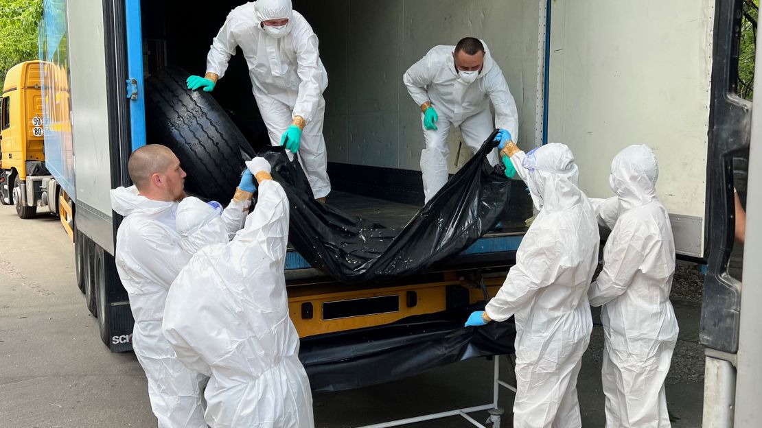 Bodies being delivered to a morgue in Kyiv on June 15. 