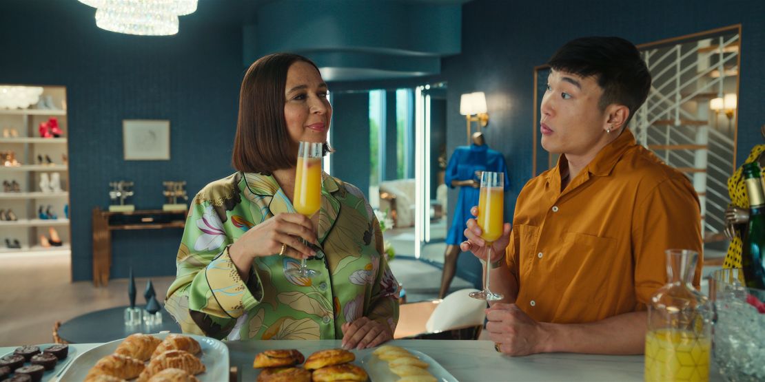 (From left) Maya Rudolph and Joel Kim Booster are shown in a scene from "Loot."