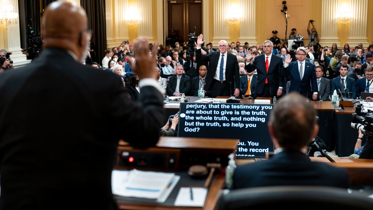 Thompson swears in witnesses at the public hearing on June 21. The witnesses, from left, are Arizona House Speaker Rusty Bowers, Georgia Secretary of State Brad Raffensperger and Georgia elections official Gabriel Sterling.