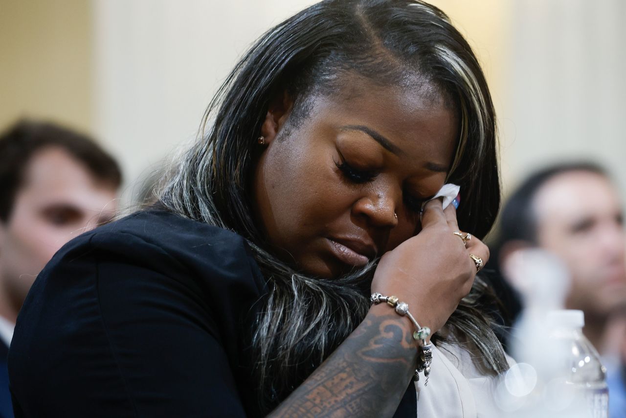 Wandrea "Shaye" Moss, a former Georgia election worker, wipes her eyes as she testifies on June 21. She told the committee about <a href="https://www.cnn.com/politics/live-news/january-6-hearings-june-21/h_ef2769ca3087fe17fe329f864e0af11a" target="_blank">"hateful" and "racist" threats</a> she received via Facebook.