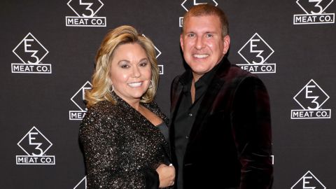 (From left) Julie Chrisley and Todd Chrisley attend the grand opening of E3 Chophouse Nashville on November 20, 2019, in Tennessee. 