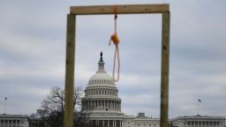 TOPSHOT - A noose is seen on makeshift gallows as supporters of US President Donald Trump gather on the West side of the US Capitol in Washington DC on January 6, 2021. - Donald Trump's supporters stormed a session of Congress held today, January 6, to certify Joe Biden's election win, triggering unprecedented chaos and violence at the heart of American democracy and accusations the president was attempting a coup. (Photo by Andrew CABALLERO-REYNOLDS / AFP) (Photo by ANDREW CABALLERO-REYNOLDS/AFP via Getty Images)