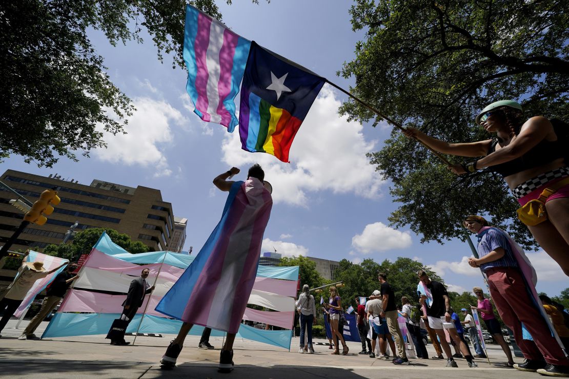 Demonstrators gather on the steps to the State Capitol to speak against transgender-related legislation  being considered in the Texas Senate and Texas House, May 20, 2021, in Austin, Texas. 