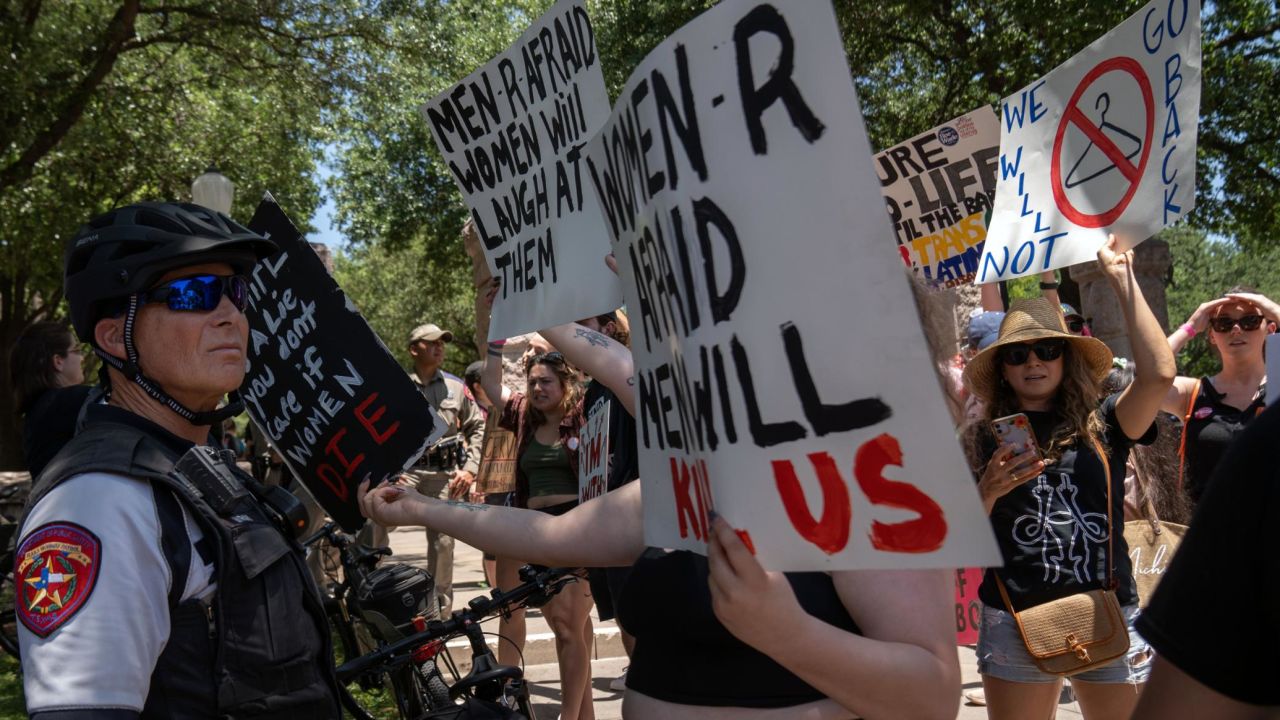 The Texas Highway Patrol stands in front of pro-life demonstrators as pro-choice supporters leave the Capitol in Austin, Texas, on Saturday May 14, 2022.