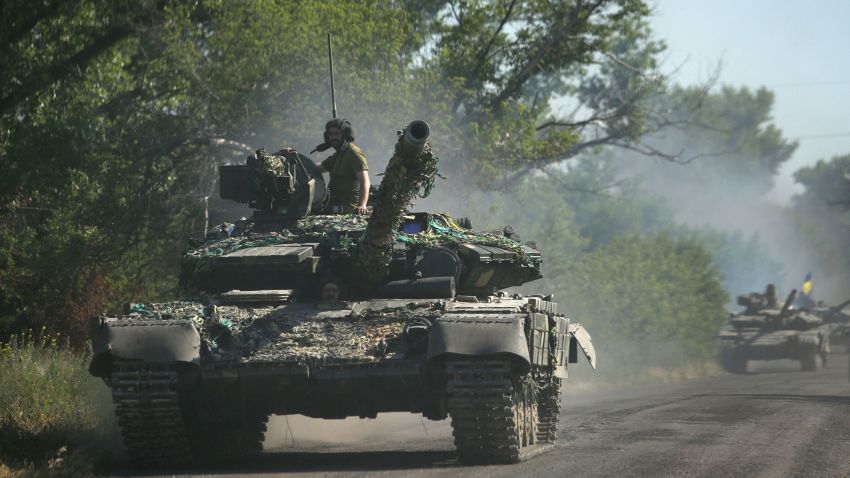 Ukrainian troop move by tanks on a road of the eastern Ukrainian region of Donbas on June 21, 2022, as Ukraine says Russian shelling has caused "catastrophic destruction" in the eastern industrial city of Lysychansk, which lies just across a river from Severodonetsk where Russian and Ukrainian troops have been locked in battle for weeks. - Regional governor Sergiy Gaiday says that non-stop shelling of Lysychansk on June 20 destroyed 10 residential blocks and a police station, killing at least one person. (Photo by Anatolii Stepanov / AFP) (Photo by ANATOLII STEPANOV/AFP via Getty Images)