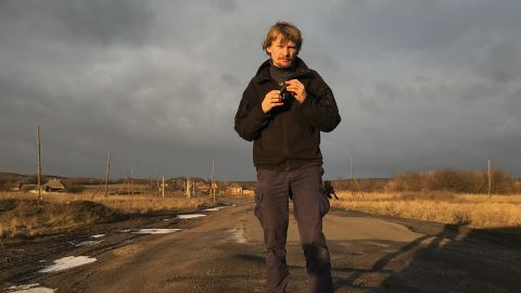 Ukrainian photojournalist Maks Levin poses for a photo in the Donetsk region in Ukraine on Jan. 12, 2018. 