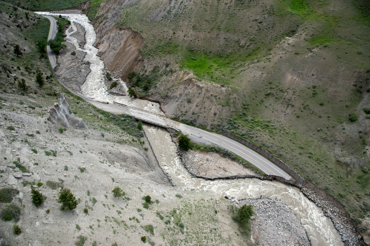 The Gardner River weaves a new channel through washed out sections of North Entrance Road in Yellowstone National Park on June 19 in Gardiner, Montana. 
