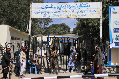 Taliban guards outside the district hospital where victims of the earthquake were brought in Paktia, Afghanistan, on June 22.