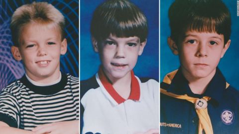Yearbook photos of  Steve Branch, Chris Byers and Michael Moore presented as state's evidence. 