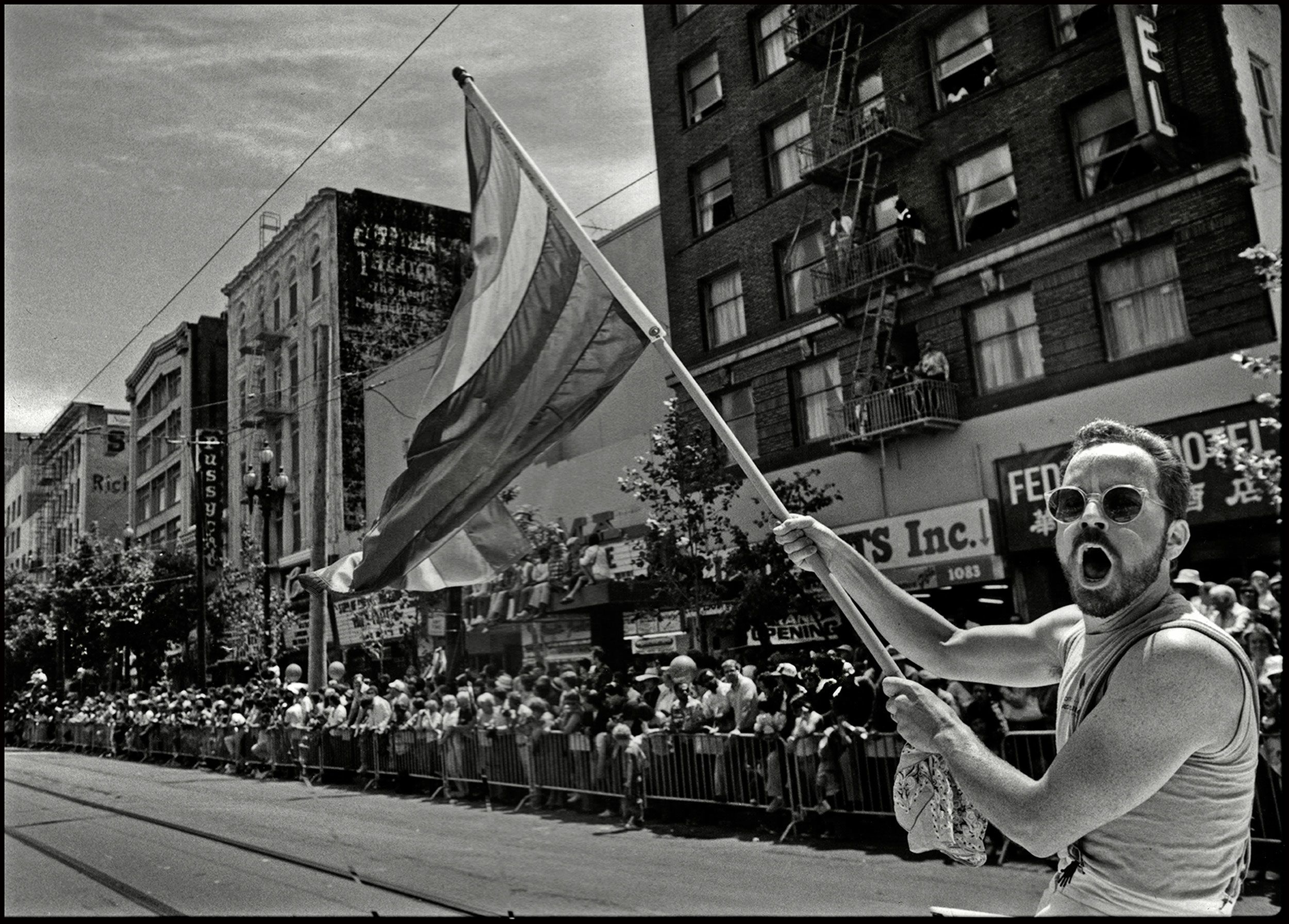 A Pride flag is waved during the International Lesbian & Gay Freedom Day Parade in San Francisco in 1985.