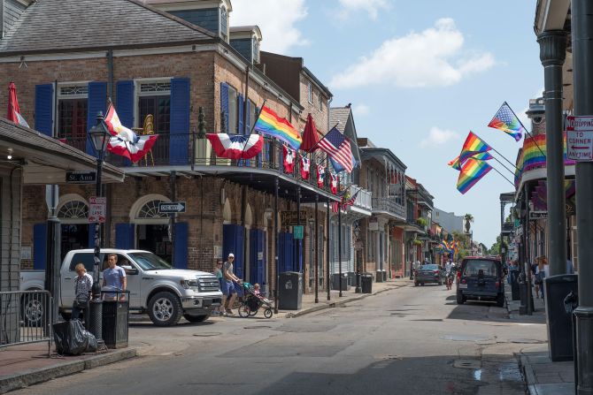 Pride flags fluttering in the breeze in the French Quarter of New Orleans.