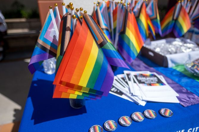 Flags and pins for attendees during a Progressive Pride Flag ceremony at San Fernando City Hall on Wednesday, June 1, 2022 in California. In 2021, the San Fernando City Council adopted a resolution declaring June as Lesbian, Gay, Bisexual, Transgender and Queer Pride Month (LGBTQ+) in the city. 