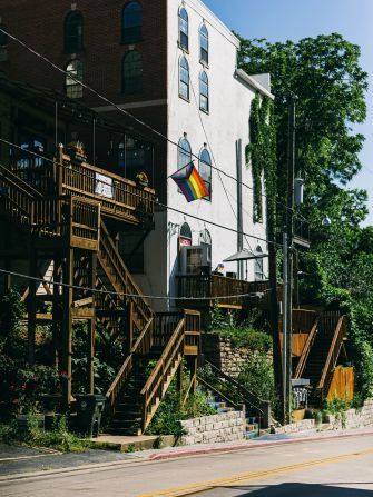 A pride flag flies in downtown Eureka Springs, Arkansas, on June 21, 2022. Eureka Springs is considered a haven in the South for LGBTQ residents.