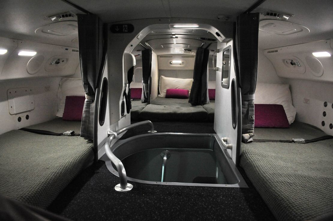 On this Boeing 787 Dreamliner, the rest room for crew members is located at the back of the plane.