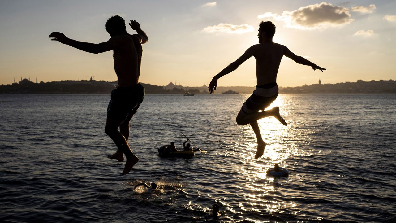 Men jump into the waters of the Bosphorus at the Anatolian side, also known as the Asian side, of Istanbul. Males around the world have a higher drowning risk than that of females.