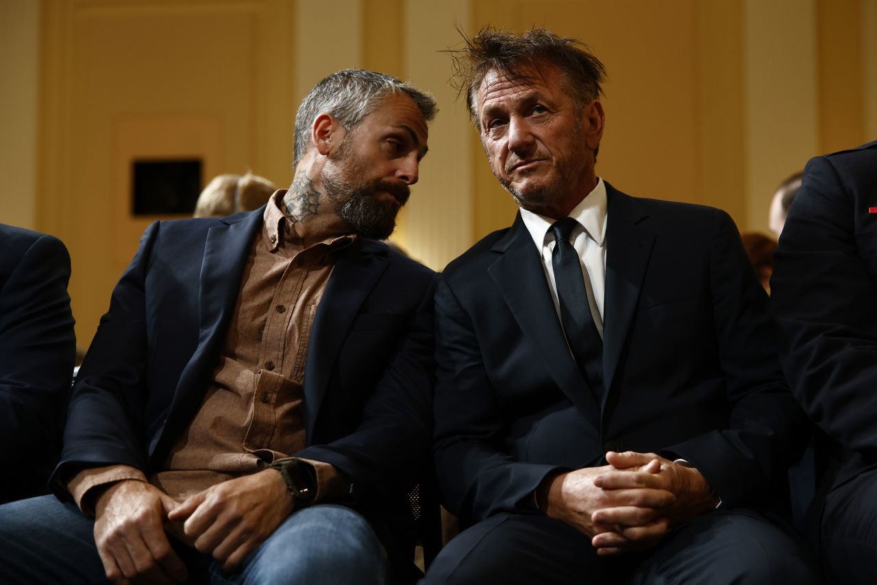 From left, former Metropolitan Police Department officer Michael Fanone and actor Sean Penn attend the hearing on June 23. Penn, who has been following the committee hearings, <a href=
