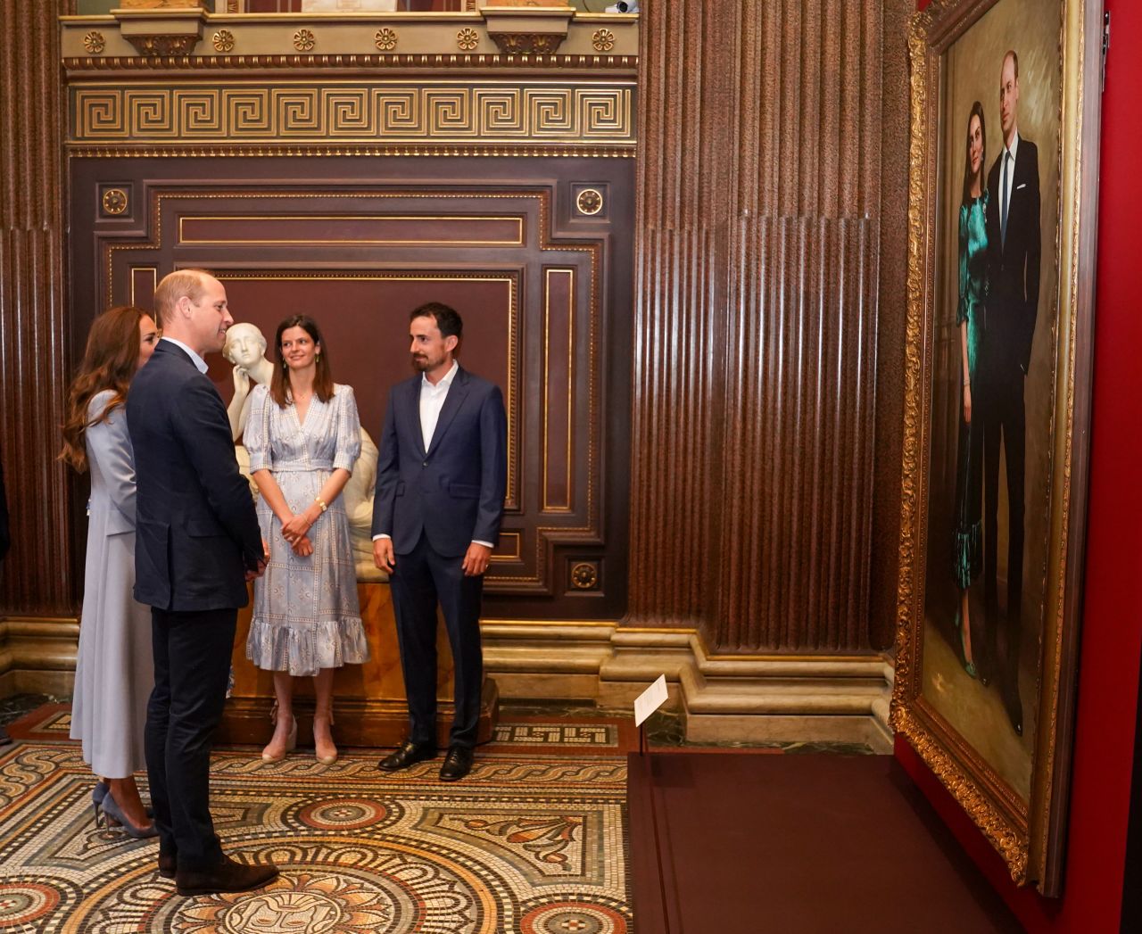 Prince William, Duke of Cambridge and Catherine, Duchess of Cambridge visit Fitzwilliam Museum Cambridge where the royal couple viewed a portrait of of themselves painted by artist Jamie Coreth during an official visit to Cambridgeshire on June 23, 2022 in Cambridge, England.