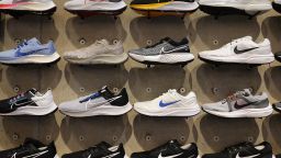 Shoes line the shelves at the Nike store on December 21, 2021 in Miami Beach, Florida.