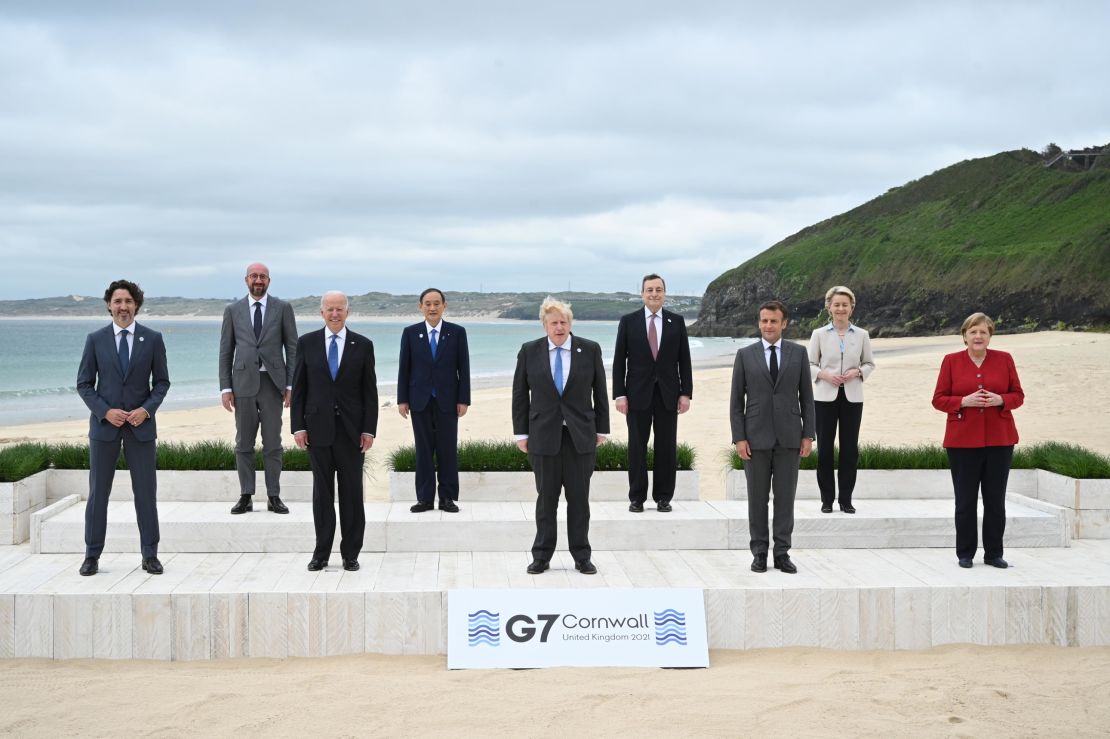 G7 leaders pose for the official welcome and family photo during the UK-hosted G7 Summit in Cornwall's Carbis Bay in June last year.