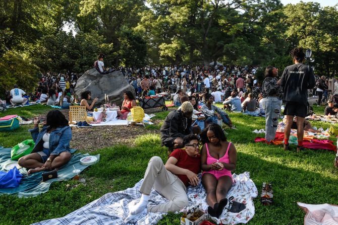 People attend a <a href="https://www.cnn.com/2022/06/19/us/gallery/juneteenth-holiday-2022/index.html" target="_blank">Juneteenth celebration</a> at Fort Greene Park in Brooklyn, New York on Sunday, June 19. Juneteenth became a federal holiday last year. 