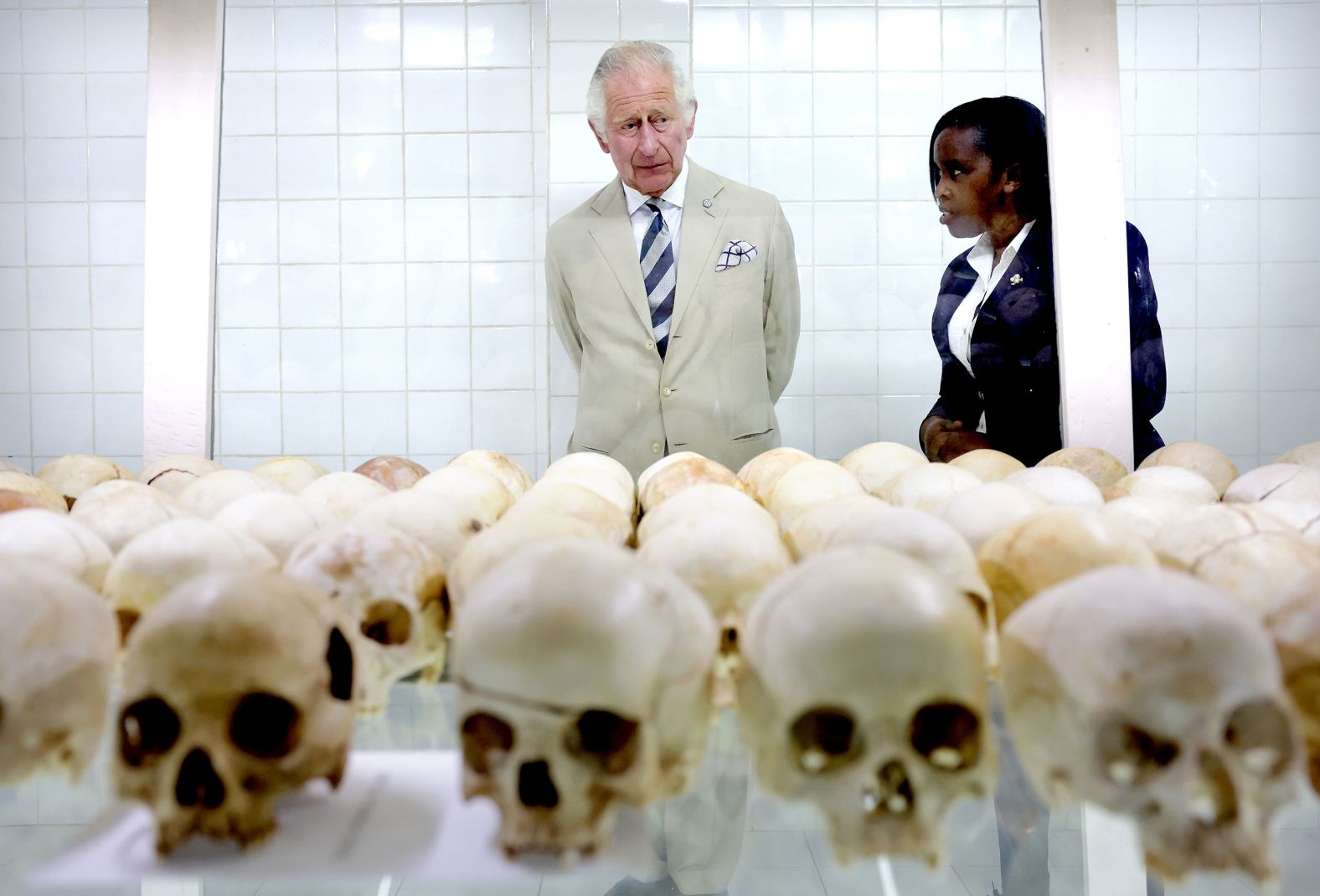 Charles is shown skulls of victims during a visit to the Nyamata Church Genocide Memorial in Nyamata, Rwanda, in June 2022. In 1994, Hutu extremists targeted minority ethnic Tutsis and moderate Hutus in a three-month killing spree that left an estimated 800,000 people dead, though local estimates are higher.