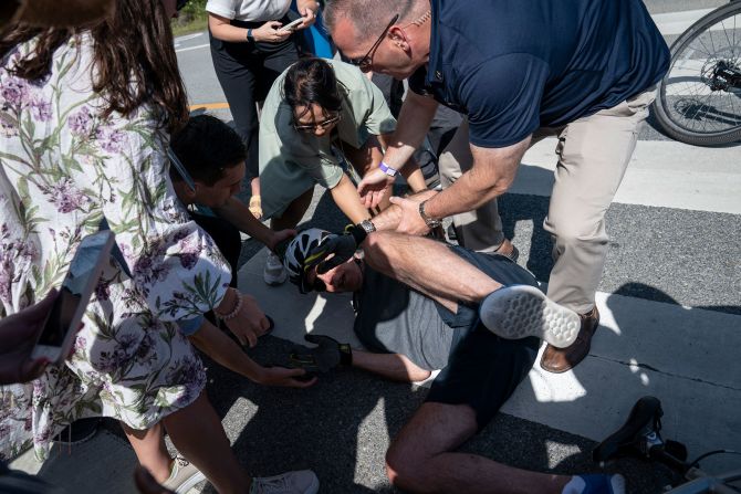 US President Joe Biden is helped by Secret Service agents<a href="https://www.cnn.com/2022/06/18/politics/biden-falls-riding-bike/index.html" target="_blank"> after he fell trying to get off his bike</a> to greet a crowd in Rehoboth Beach, Delaware on Saturday, June 18. Biden did not require any medical attention at the scene. The Bidens spent the long weekend at their home in Rehoboth Beach, in part to celebrate their 45th wedding anniversary. 