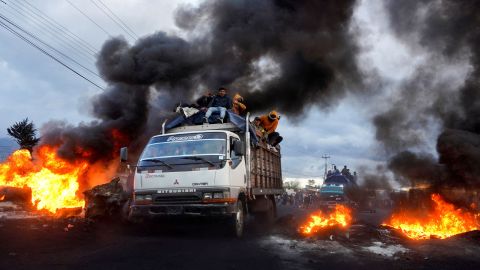 Demonstrators protesting rising fuel and living costs are seen in Quito, Ecuador last month.