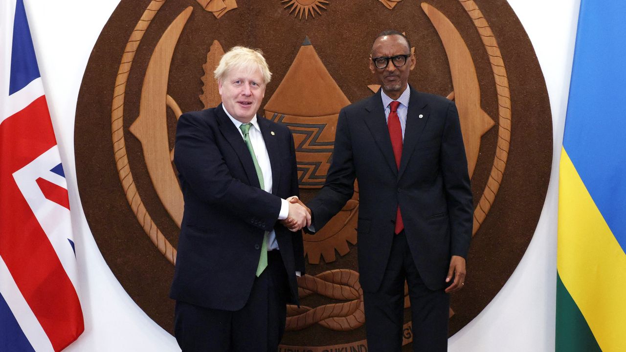 British Prime Minister Boris Johnson shakes hands with Rwandan President Paul Kagame during a bilateral meeting on the sidelines of the Commonwealth Heads of Government Meeting (CHOGM) at the office of the President in Kigali, Rwanda June 23, 2022. Dan Kitwood/Pool via REUTERS