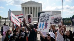 People protest about abortion, Friday, June 24, 2022, outside the Supreme Court in Washington.