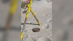 A suspected land mine was removed from a Florida beach.