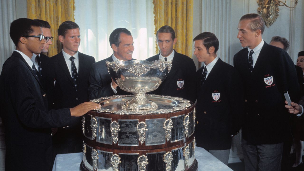 President Nixon hosts the United States Davis Cup team at the White House. Left to right: Arthur Ashe; Clark Graebner; Dennis Ralston, coach; President Nixon; Donald Doll; Bob Luts and Stan Smith.