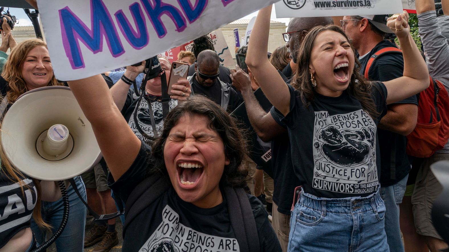 Anti-abortion protesters celebrate outside the US Supreme Court in Washington, DC, on Friday.