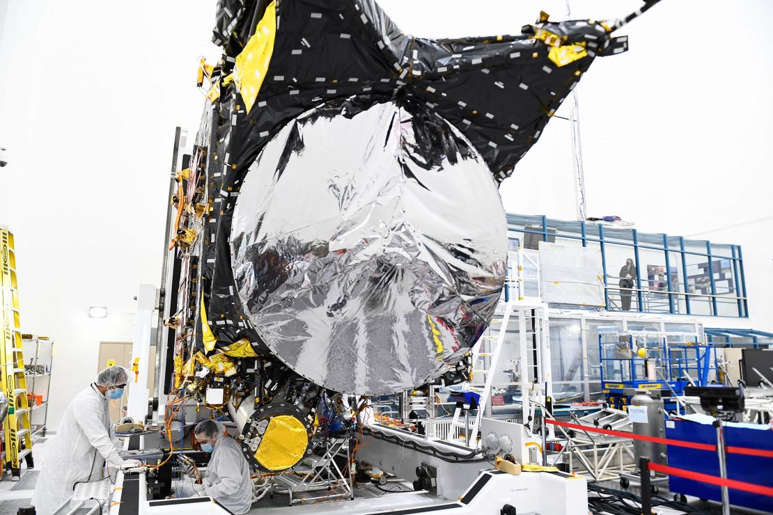 Engineers prepare the Psyche spacecraft inside a clean room at NASA's Jet Propulsion Laboratory in Pasadena, California, on April 11.