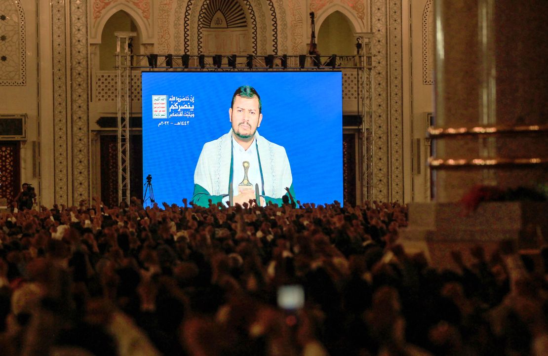 Supporters of Yemen's Houthi movement listen to a speech by their leader Abdel Malek al-Houthi, transmitted via a giant screen inside a mosque in the capital Sanaa on June 22. 
