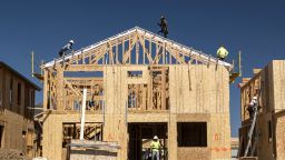 Contractors work on a home under construction in Antioch, California, US, on Tuesday, June 14, 2022. The number of home sellers lowering prices has reached the highest level since October 2019, the latest sign that the housing market is slowing from its once-frenzied pandemic pace. 