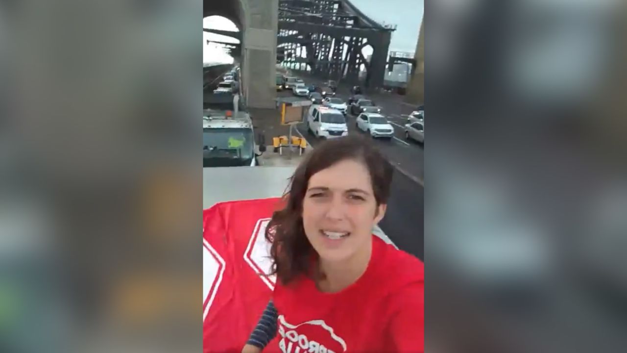 Violet Coco livestreamed her message from the top of a truck blocking one lane of traffic on Sydney Harbour Bridge in April, 2022. 
