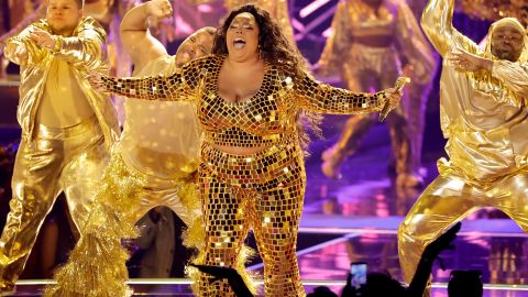 Lizzo (center) performs onstage during the 2022 BET Awards at Microsoft Theater on June 26 in Los Angeles. 